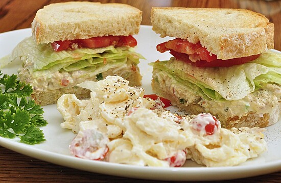 Auntie M’s Deviled Egg Salad with pasta salad, fresh vegetables, and vibrant colors on a plate.