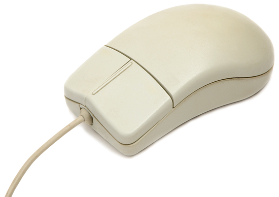 Classic beige computer mouse showcasing vintage design, ergonomic shape, and durable wired connection.