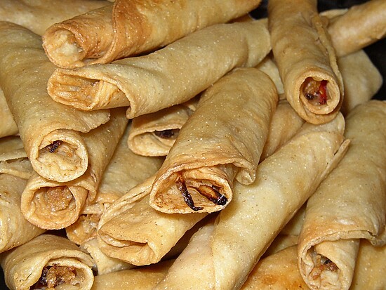 Golden crispy taquitos, savory rolled snacks perfect for sharing and enjoying anytime.