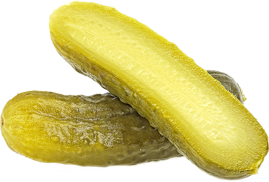 Vibrant pickles cut lengthwise showcase texture and color differences in pickling methods.