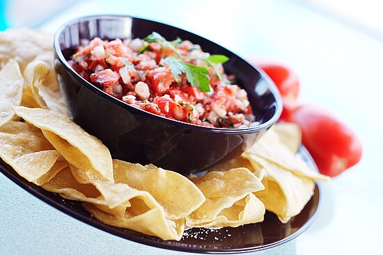 Crispy tortilla chips served with fresh pico de gallo, perfect for sharing and celebrations.